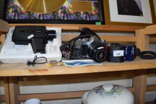 A Canon AV-1 camera together with a Halina hand held cine camera and assorted equipment