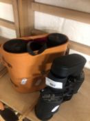 A pair of Tasco zip focus binoculars together with a pair of Perl 9x35 binoculars, cased