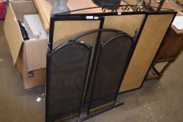 A tri-fold fire guard and another smaller