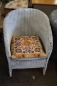White painted Lloyd Loom style chair and crewel work cushion