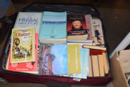 Suitcase of assorted books, various topics