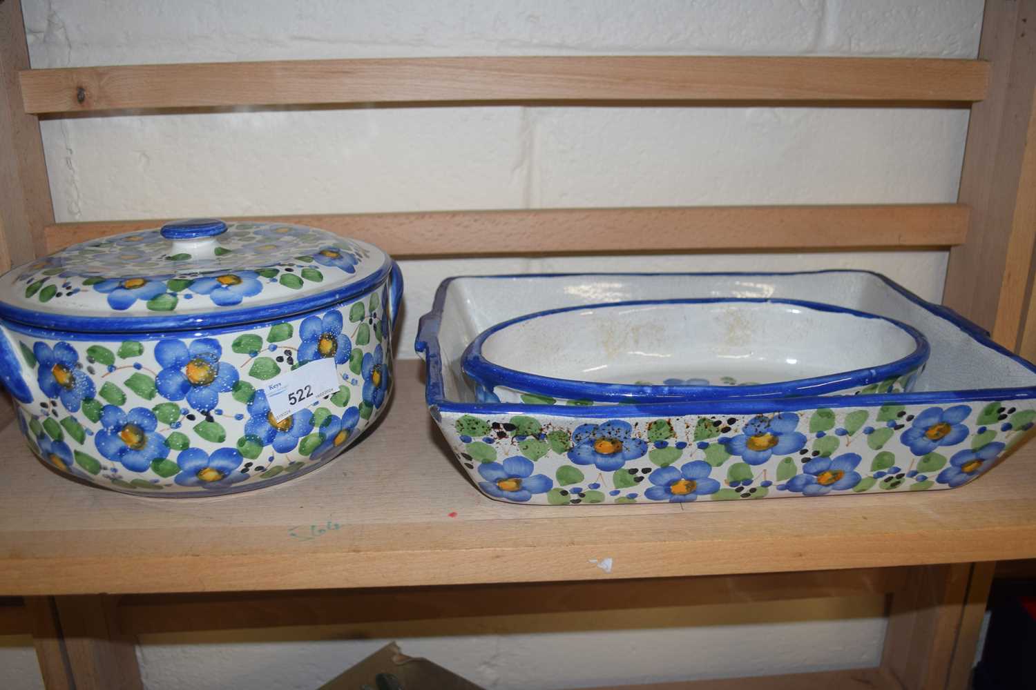 Three items of continental floral decorated bake ware