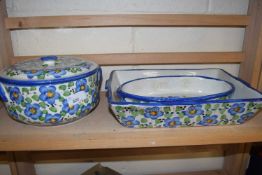 Three items of continental floral decorated bake ware