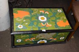 A carved floral and painted storage box