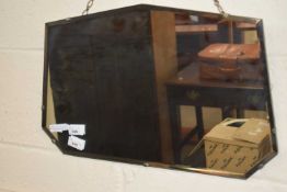 A hanging wall mirror