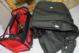 A quantity of fishing equipment to include rod bag, kit bag and sundry contents to include reels,