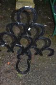 Horseshoe shaped garden ornament