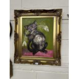 20th Century school study of a cat with a fish skeleton, oil on canvas, gilt framed