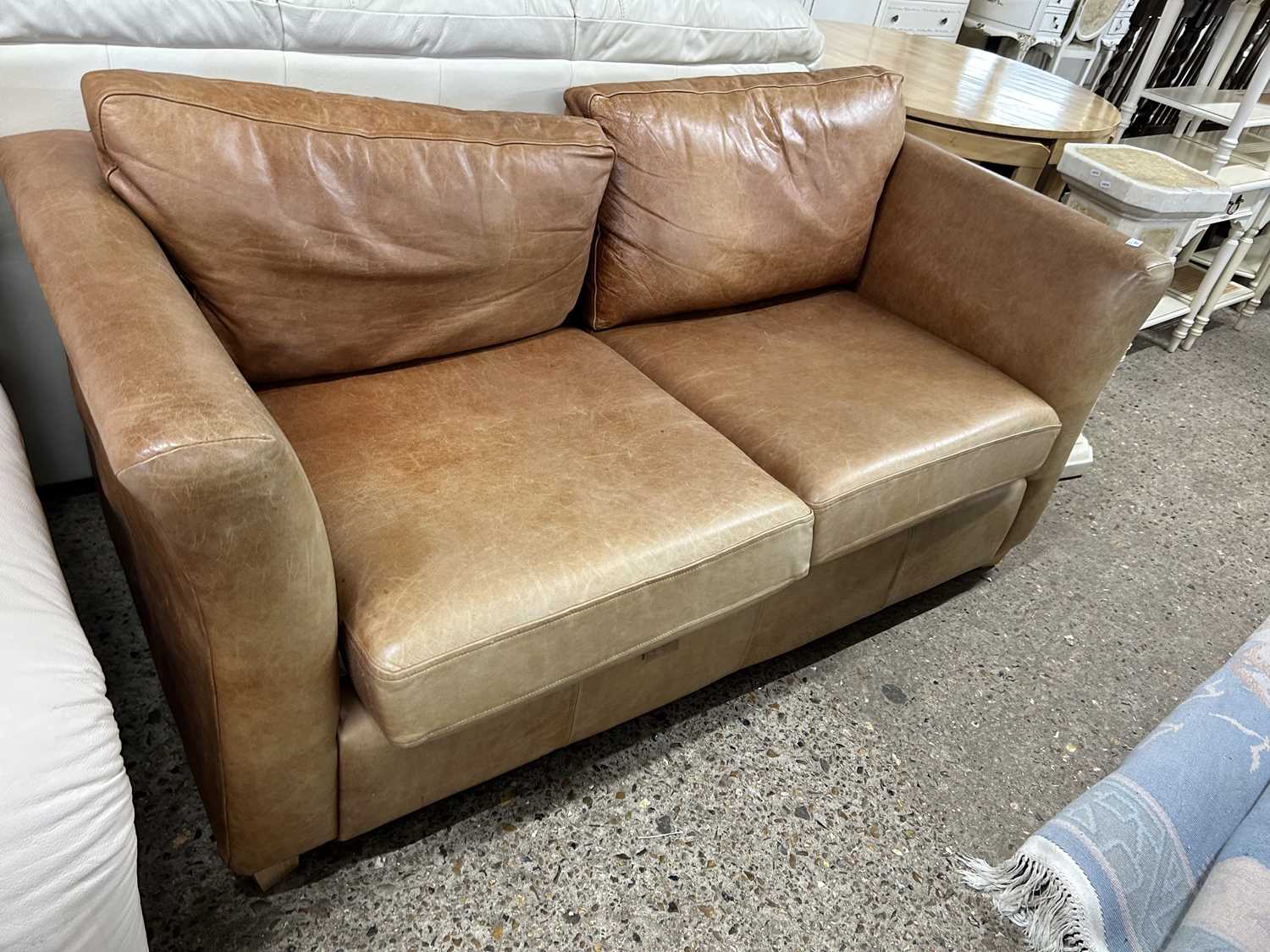 Brown leather two seater sofa