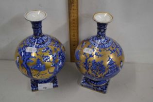 A pair of Foley ware pedestal vases with Chinese type decoration (one repaired)