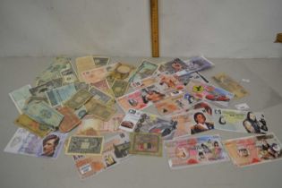 Group of various heavily circulated world bank notes