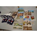 Collection of modern French boxed medallions together with assorted postcards, albums of cigarette