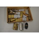 Case of various vintage cigarette lighters to include brass examples