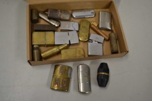 Case of various vintage cigarette lighters to include brass examples