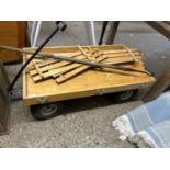 A hand cart together with a shepherds crook