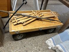 A hand cart together with a shepherds crook