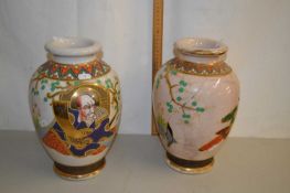 A pair of early 20th Century Japanese crackle glazed satsuma vases, one with significant body