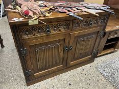 An Old Charm dark oak small side cabinet with two drawers and two doors