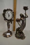 A bronzed resin model of an Art Nouveau young lady together with a similar mantel clock