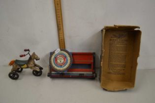 A child's Simplex typewriter together with a toy wheeled horse