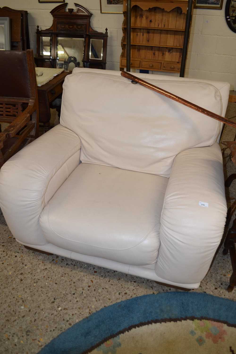 Modern cream leather armchair