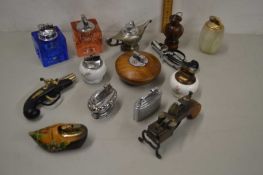 Collection of various table lighters to include novelty examples