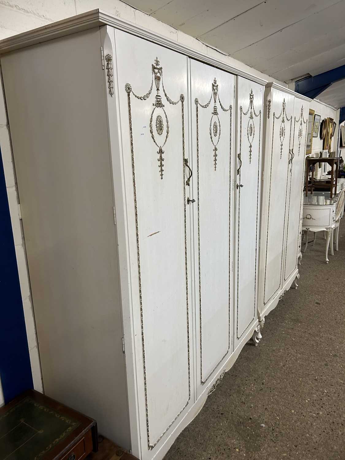 20th Century French style triple door wardrobe together with a similar two door example (2)