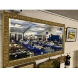 Large 20th Century rectangular bevelled wall mirror in gilt finish frame, 135cm wide