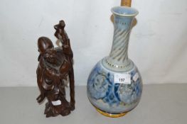 Royal Doulton stone ware vase together with a Chinese hardwood figure (2)