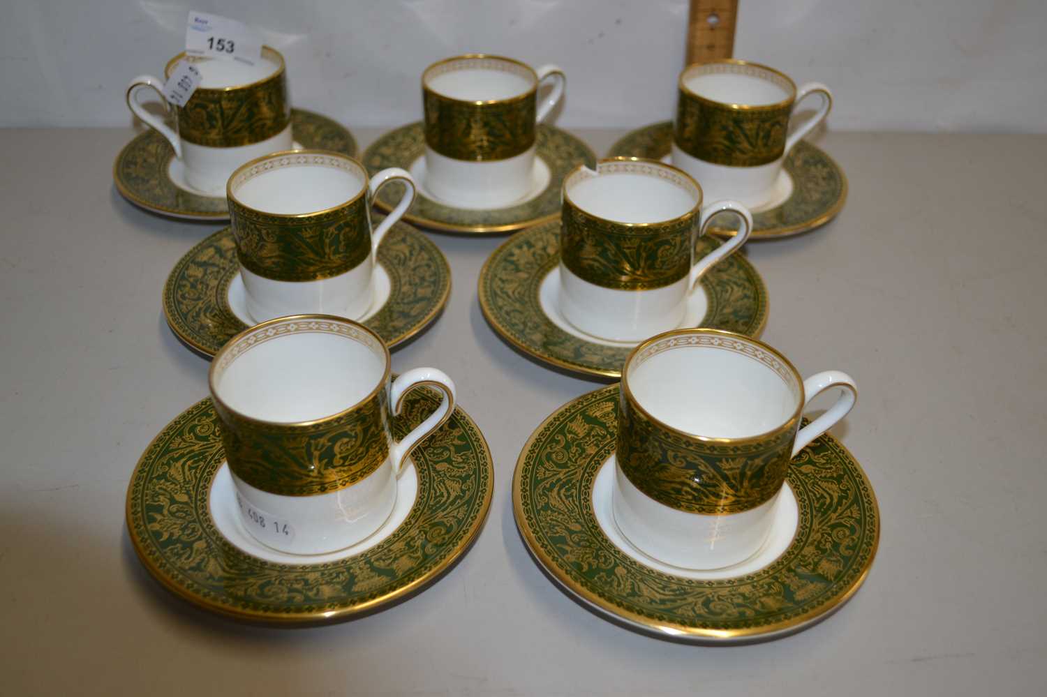 Wedgwood Florentine pattern set of seven coffee cups and saucers