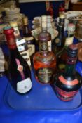 Mixed Lot: Eight various bottles to include Cherry Brandy, Chivas Blended Scotch Whisky, Jim Beam