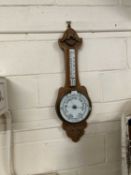 An early 20th Century oak cased barometer