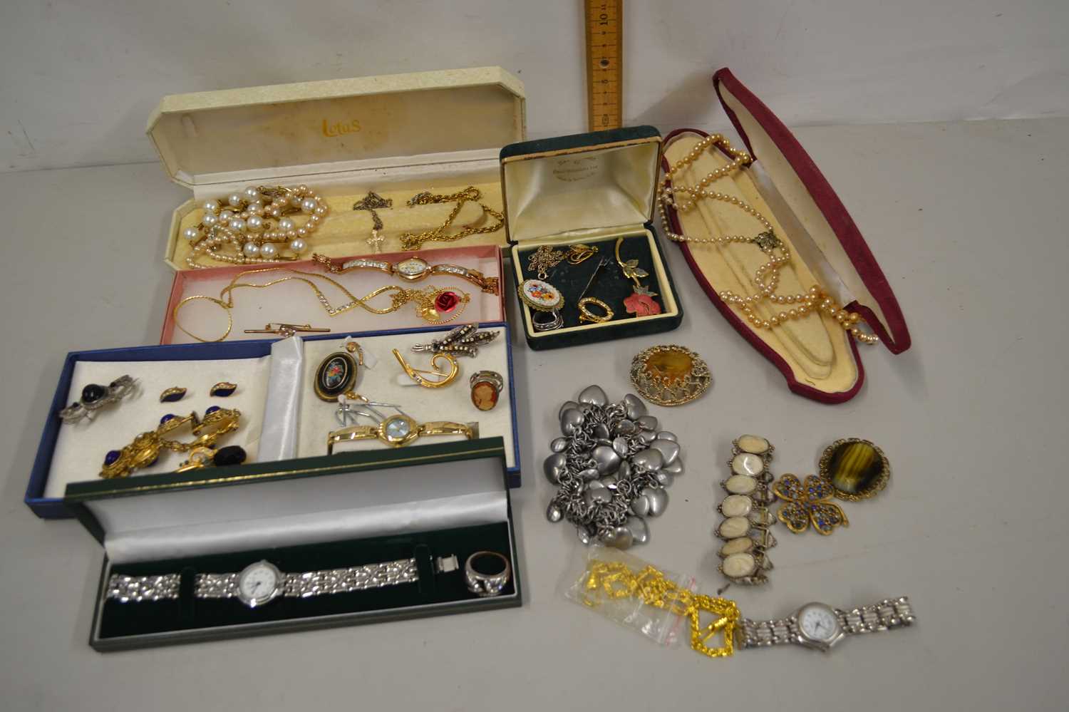 A basket of various costume jewellery