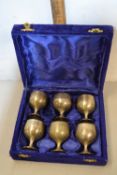 Case of small silver plated goblets