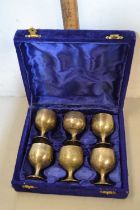 Case of small silver plated goblets