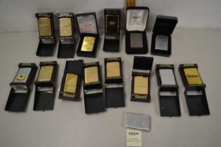Quantity of boxed Zippo lighters to include various advertising examples
