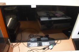 Toshiba flat screen TV and remote control
