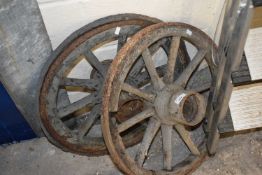 Pair of small iron framed implement wheels
