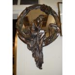 An Art Nouveau styled bronzed resin wall mirror