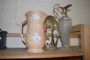 A Withersea jug, another and a claret style jug