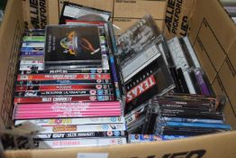 Quantity of assorted CD's and DVD's