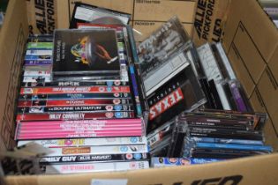 Quantity of assorted CD's and DVD's