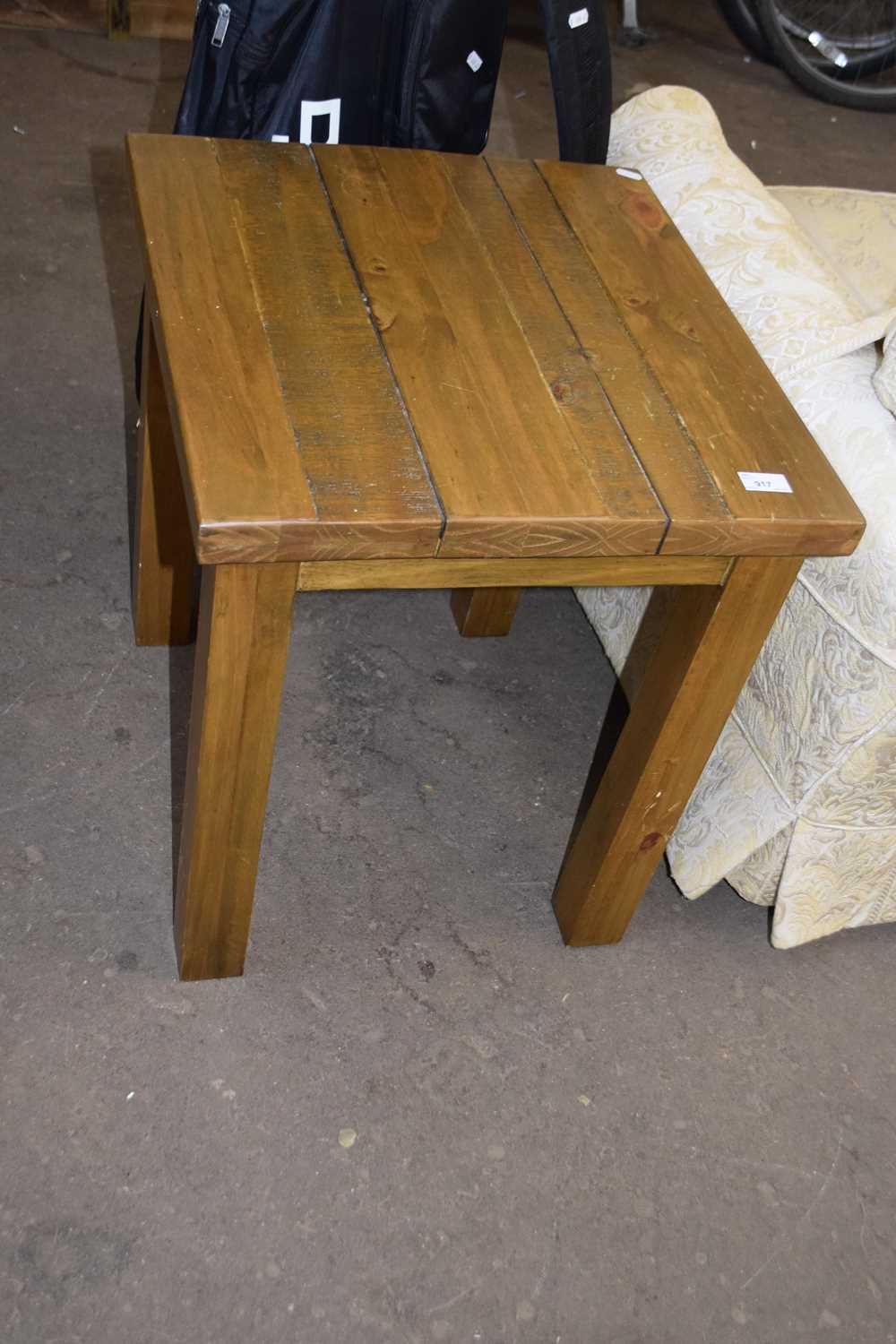 A stained pine coffee table