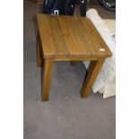 A stained pine coffee table