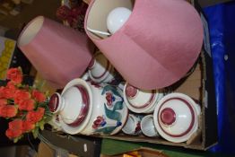 Quantity of Eden pottery floral decorated storage jars with matching pair of lamps and a vase