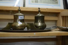 Assorted metal wares to include two Eastern jars and covers, white metal tray etc