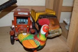 A tin plate cockerel and tin plate car and a model truck