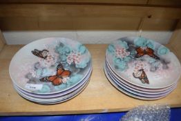 Quantity of collectors plates decorated with butterflies
