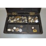 Box containing a large quantity of various wristwatch movements