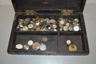 Box containing a large quantity of various wristwatch movements